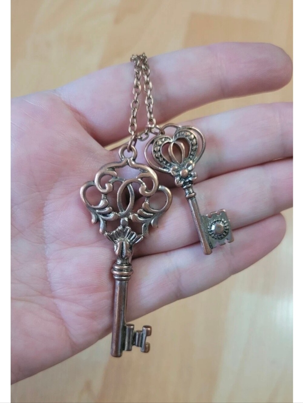 Aldo long necklace with key pendants
